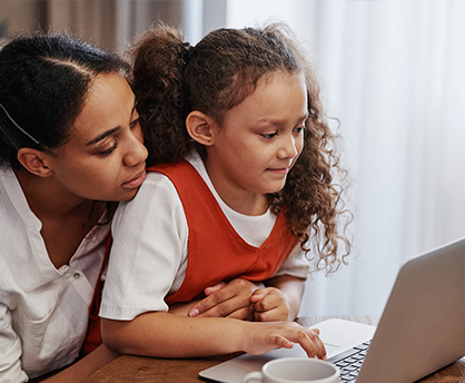 Parent and child giving feedback online