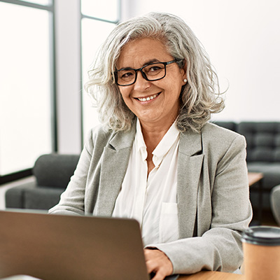 Education administrator working on laptop