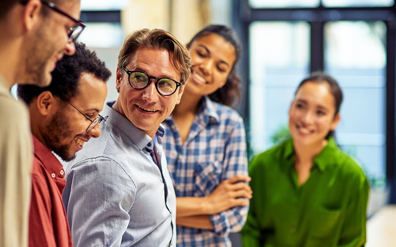 Team of government experience professionals collaborating