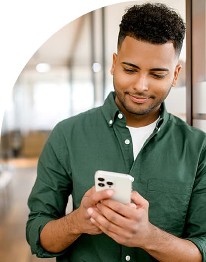 Male government employee reading about data-driven insights to transform government service delivery in the State of Digital Government Report