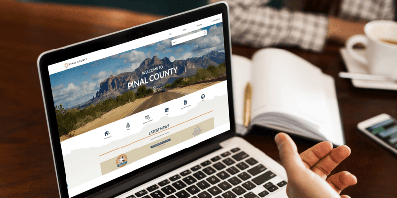 The Pinal County, Arizona website displayed on a laptop.